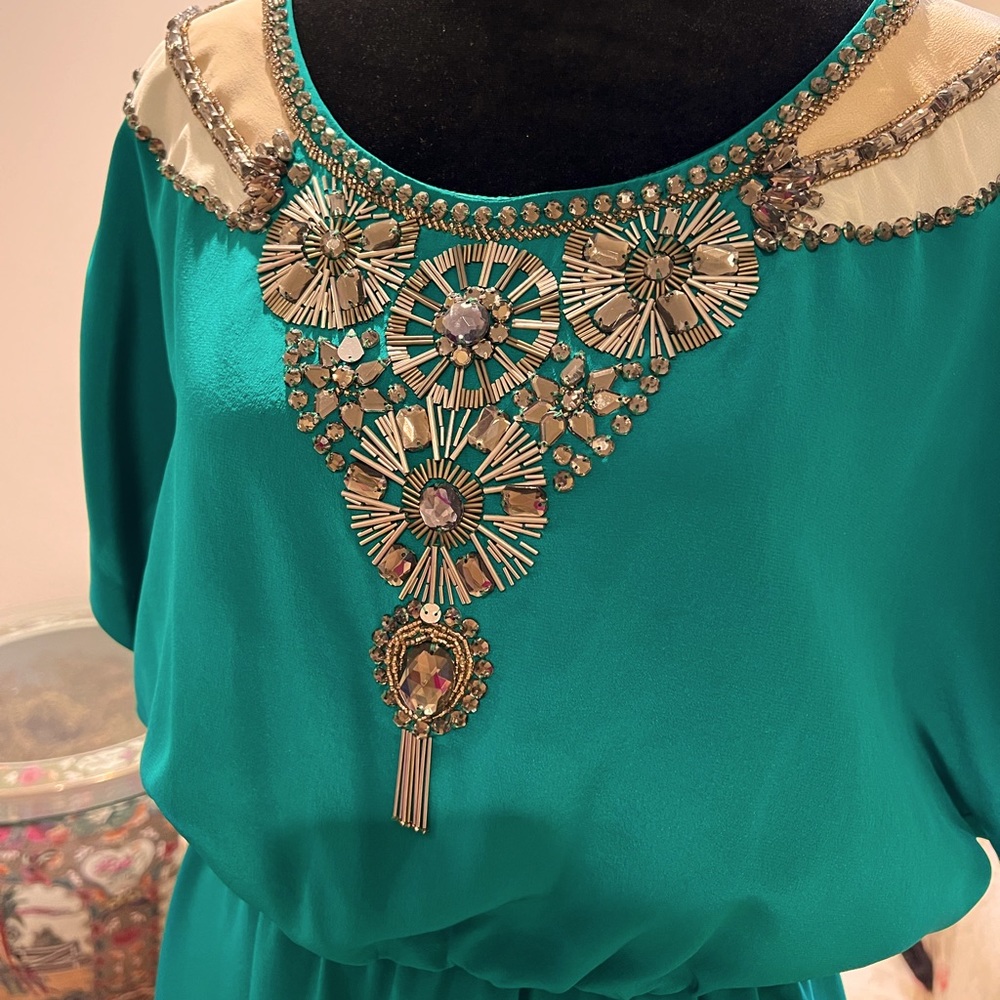 Trina Turk beaded neckline green cocktail dress. Fully elastic waist. Size 6/M